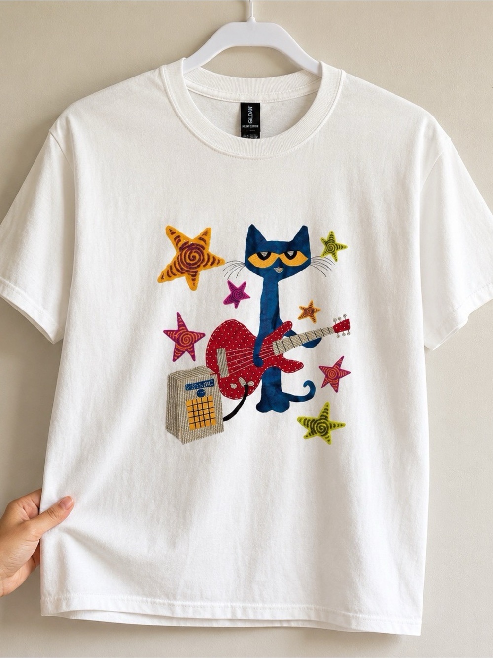 Gildan White Tee with Blue Cat Playing Red Guitar and Colorful Stars
